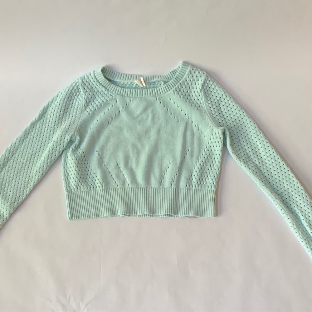 Like new Ivivva sweater. Fits girls size 10.
